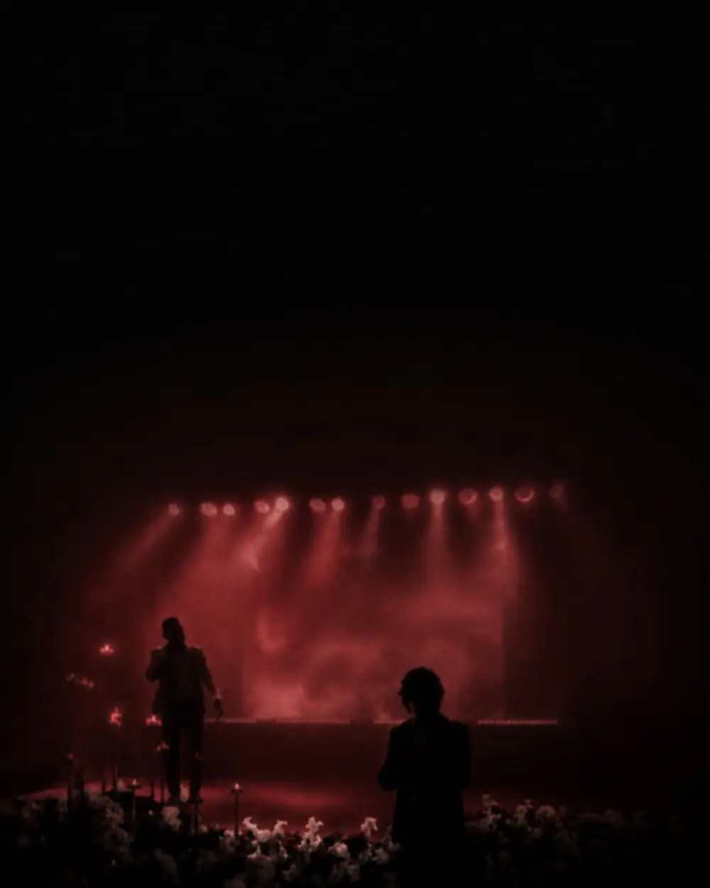 A brand event on stage under red lighting, produced by TV Sri Lanka